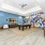 Pool table and shuffleboard in NOVO Avian Pointe's game room