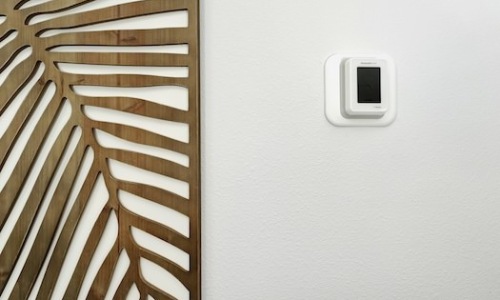 Photo of the smart thermostats inside each of NOVO Avian Pointe’s Apartment Homes