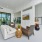Outdoor lounge seating and TV in NOVO Avian Pointe's clubhouse
